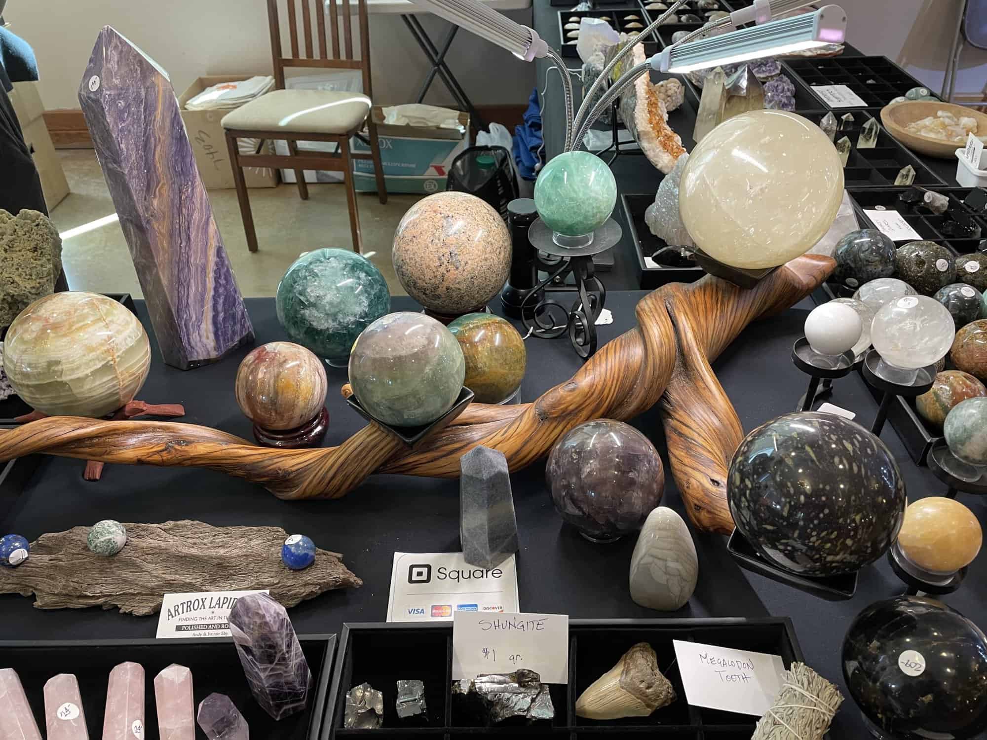 photo of ArtRox Lapidary booth featuring stone spheres